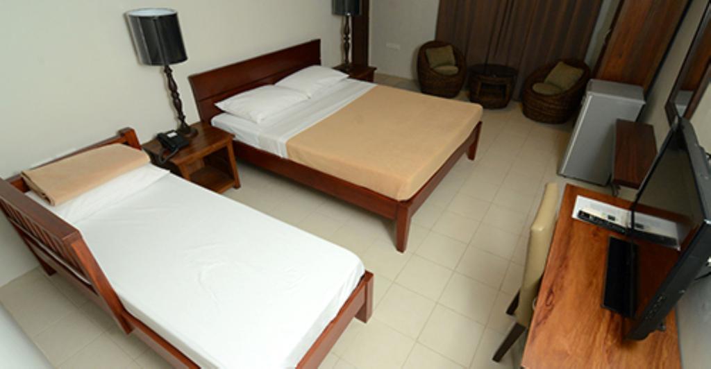 Isabel Suites Laoag Phòng bức ảnh
